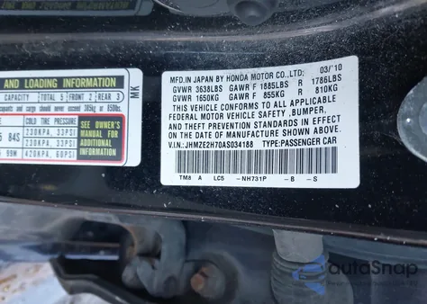 2010 Honda Insight Ex z USA, uszkodzony, nr VIN JHMZE2H70AS034188